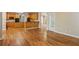Open eat-in kitchen with wood floors and stainless steel appliances at 980 Ector Chase Nw, Kennesaw, GA 30152