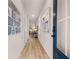 Well lit hallway with hardwood flooring and a glass door to the outside at 1122 Edinberg Dr, Villa Rica, GA 30180