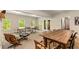 Spacious basement area perfect for entertainment featuring a ping pong table and dining table at 130 River Ne Lndg, Sandy Springs, GA 30350