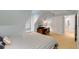 Well-lit bedroom featuring neutral carpet, soft color palette, and a built-in desk at 130 River Ne Lndg, Sandy Springs, GA 30350