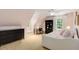 Well-lit bedroom featuring neutral carpet, soft color palette, and a built-in desk at 130 River Ne Lndg, Sandy Springs, GA 30350