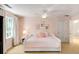Charming bedroom featuring a white daybed, neutral carpet and a soft color palette at 130 River Ne Lndg, Sandy Springs, GA 30350
