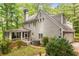 Exterior of home with screened porch, back yard and garage at 130 River Ne Lndg, Sandy Springs, GA 30350
