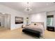 Spacious main bedroom with neutral tones, seating area, and large windows at 130 River Ne Lndg, Sandy Springs, GA 30350