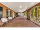 Spacious brick patio with covered porch perfect for outdoor living at 130 River Ne Lndg, Sandy Springs, GA 30350