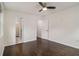 Bedroom featuring hardwood floors, a ceiling fan, and ensuite bathroom at 1926 Lakewood Se Ter, Atlanta, GA 30315