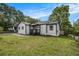 Charming single-story home with a welcoming front porch and well-maintained lawn at 1926 Lakewood Se Ter, Atlanta, GA 30315