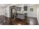 Modern kitchen with gray cabinets, stainless steel appliances and an island at 1926 Lakewood Se Ter, Atlanta, GA 30315