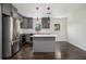 Modern kitchen with stainless appliances, grey cabinets and island at 1926 Lakewood Se Ter, Atlanta, GA 30315