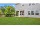 Spacious backyard features a well-kept lawn, privacy fence, and ample space for recreation at 4591 Grenadine Cir, Acworth, GA 30101