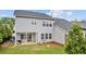 Expansive backyard with patio area, perfect for outdoor entertaining and relaxation at 4591 Grenadine Cir, Acworth, GA 30101