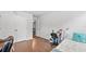 Bedroom with hardwood flooring, desk, closet and an ensuite bathroom at 4591 Grenadine Cir, Acworth, GA 30101