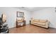 Inviting living room with hardwood flooring, a comfortable sofa, and stylish decor at 4591 Grenadine Cir, Acworth, GA 30101