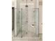 This shower features dual shower heads, a glass enclosure, and decorative tile at 670 Trinity Pl, Suwanee, GA 30024