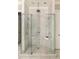 Luxurious walk-in shower with dual shower heads, marble tile, and glass enclosure at 670 Trinity Pl, Suwanee, GA 30024