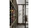 Custom wine cellar with wooden racks for bottle storage and space for glassware at 670 Trinity Pl, Suwanee, GA 30024
