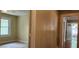 Bedroom with neutral paint, window, and view of the front door at 1162 Sims St, Atlanta, GA 30310