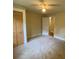 Bedroom with neutral carpet and built-in closet with ample storage space at 1162 Sims St, Atlanta, GA 30310