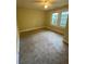 Bedroom with neutral carpeting, and sunny windows at 1162 Sims St, Atlanta, GA 30310