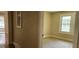 Bedroom featuring neutral carpet and paint with a window view at 1162 Sims St, Atlanta, GA 30310