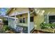 Cozy home featuring a covered porch with ceiling fan and classic shutters at 1162 Sims St, Atlanta, GA 30310