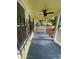 Charming front porch with dark painted flooring and decorative wrought iron at 1162 Sims St, Atlanta, GA 30310