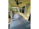 Covered front porch with painted floors and railings, offering a cozy outdoor space at 1162 Sims St, Atlanta, GA 30310