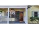 Inviting front porch with ceiling fan and secured entry offering a relaxing outdoor space at 1162 Sims St, Atlanta, GA 30310