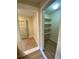 Efficient hallway featuring modern flooring leading to a storage closet at 1162 Sims St, Atlanta, GA 30310
