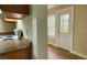 A kitchen corner includes an oven, tan counter top, and a door to the outside at 1162 Sims St, Atlanta, GA 30310