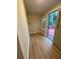 Efficient laundry room featuring modern flooring and a door to the outdoor deck at 1162 Sims St, Atlanta, GA 30310