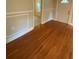 Spacious living room featuring hardwood floors and classic trim detail at 1162 Sims St, Atlanta, GA 30310