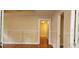 Living room showing original hardwood flooring and architectural wainscoting detail at 1162 Sims St, Atlanta, GA 30310