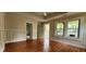 Bright living room with hardwood floors, tray ceilings and trim work throughout at 1162 Sims St, Atlanta, GA 30310
