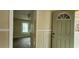 Living room featuring neutral carpet and paint with entry door view at 1162 Sims St, Atlanta, GA 30310