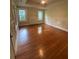 Bright living room with hardwood floors, fireplace, and classic trim detail at 1162 Sims St, Atlanta, GA 30310