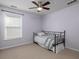 Cozy bedroom with soft carpet and a ceiling fan at 1535 Justine Se Way, Mableton, GA 30126
