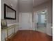 Spacious foyer with hardwood floors, large mirror, and convenient access to an adjacent home office space at 1535 Justine Se Way, Mableton, GA 30126