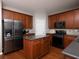 Modern kitchen featuring stainless steel appliances, a functional center island, and ample cabinet space at 1535 Justine Se Way, Mableton, GA 30126
