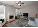 Inviting living room featuring a cozy fireplace and stylish decor at 1535 Justine Se Way, Mableton, GA 30126
