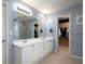 Beautiful main bathroom with dual sinks, large mirror, and walk-in closet at 1535 Justine Se Way, Mableton, GA 30126