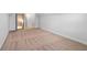 Spacious attic featuring carpeted floors, white walls and trim, and access to an adjacent hallway at 1790 Piedmont Ln, Cumming, GA 30040