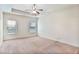Spacious bedroom featuring natural light from the windows and a ceiling fan at 1790 Piedmont Ln, Cumming, GA 30040
