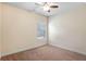 Cozy bedroom illuminated by natural light and featuring a modern ceiling fan at 1790 Piedmont Ln, Cumming, GA 30040