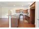 Well-lit kitchen featuring granite counters, stainless steel appliances, and an open layout at 1790 Piedmont Ln, Cumming, GA 30040