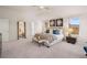Spacious main bedroom with a queen bed, ceiling fan and abundant natural light creates a serene retreat at 3064 Steinbeck Way, Atlanta, GA 30344