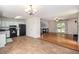 Open concept kitchen and living area with plenty of natural light and modern appliances at 115 Jamie Dr, Hiram, GA 30141