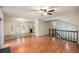 Spacious living room and kitchen area with hardwood floors at 115 Jamie Dr, Hiram, GA 30141