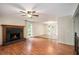 Cozy living room with hardwood floors and fireplace at 115 Jamie Dr, Hiram, GA 30141
