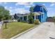 Charming two-story home with a blue exterior, landscaped yard and inviting front porch at 1598 Jonesboro Se Rd, Atlanta, GA 30315